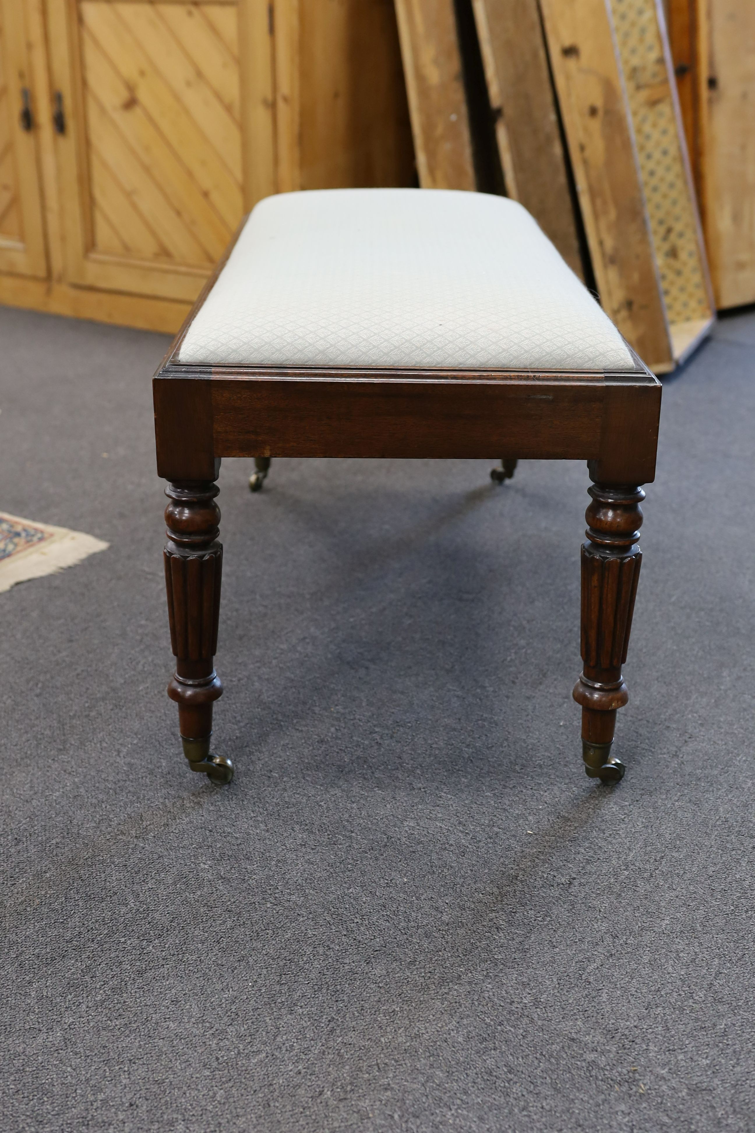 A Regency rectangular mahogany dressing stool, length 96cm, depth 46cm, height 46cm